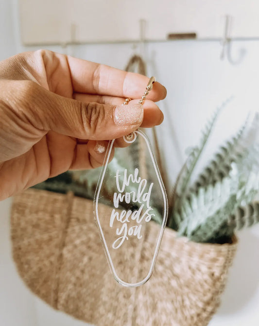The World Needs You Keychain